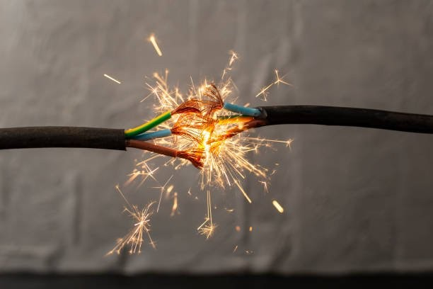 Damaged electrical cable sparking, highlighting the need for test and tag services in Archerfield industrial